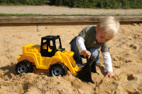 GIGA TRUCKS Aufsitz-Schaufellader, schwarz/gelb, Schaukarton